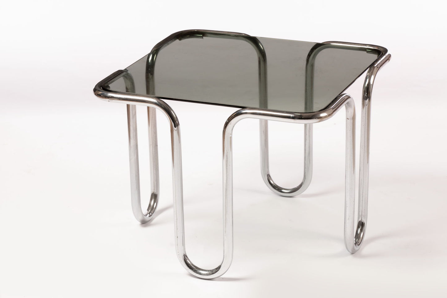 Rounded tubular steel living room table from the 70s