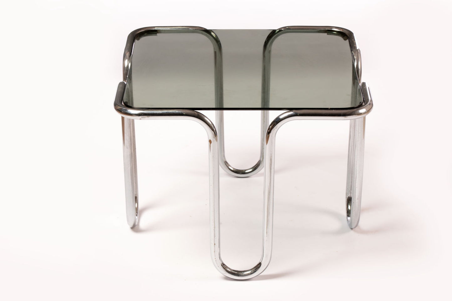 Rounded tubular steel living room table from the 70s