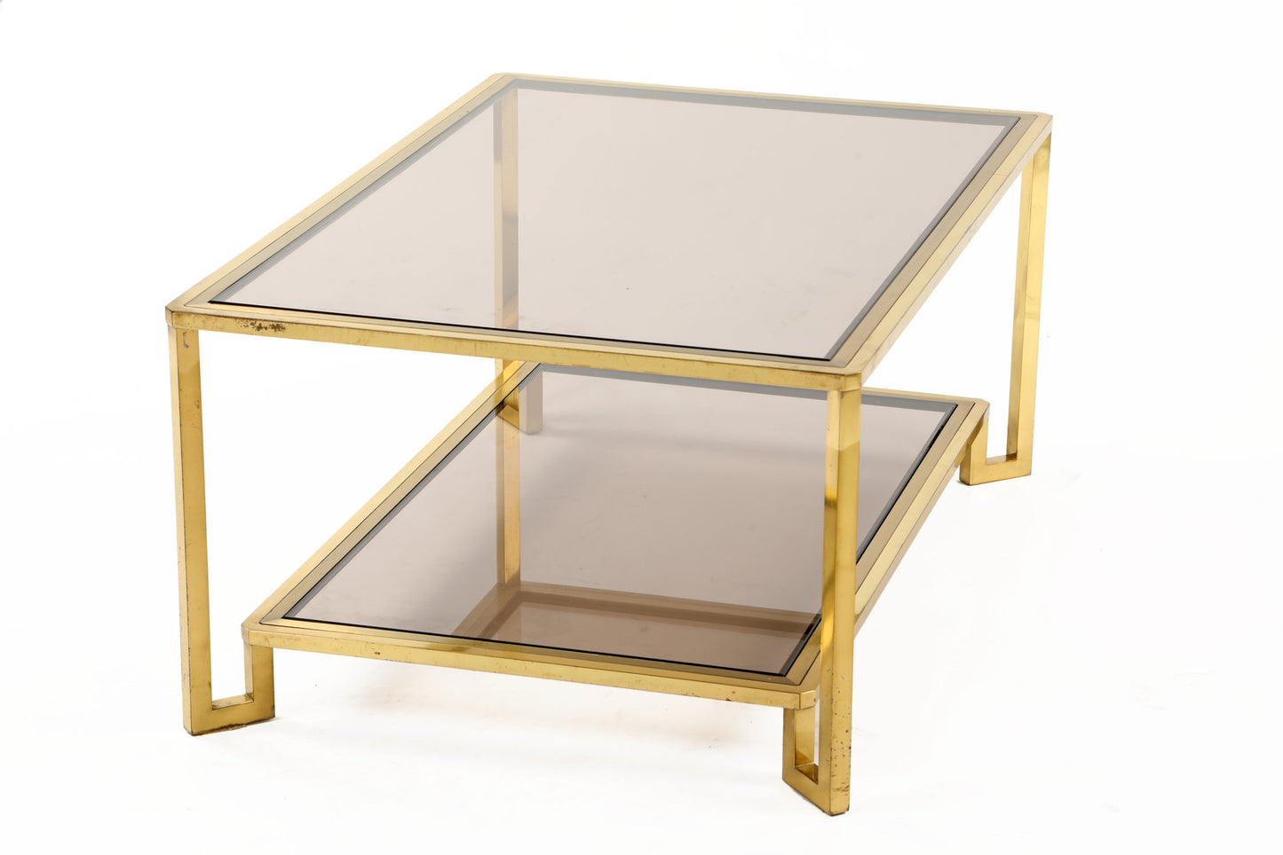 Living room table from the 70s in brass with double smoked glass shelf