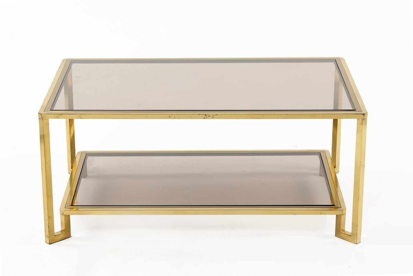 Living room table from the 70s in brass with double smoked glass shelf