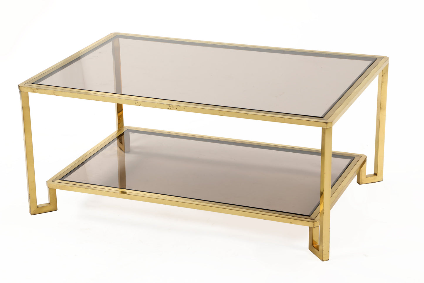 Living room table from the 70s in brass with double smoked glass shelf