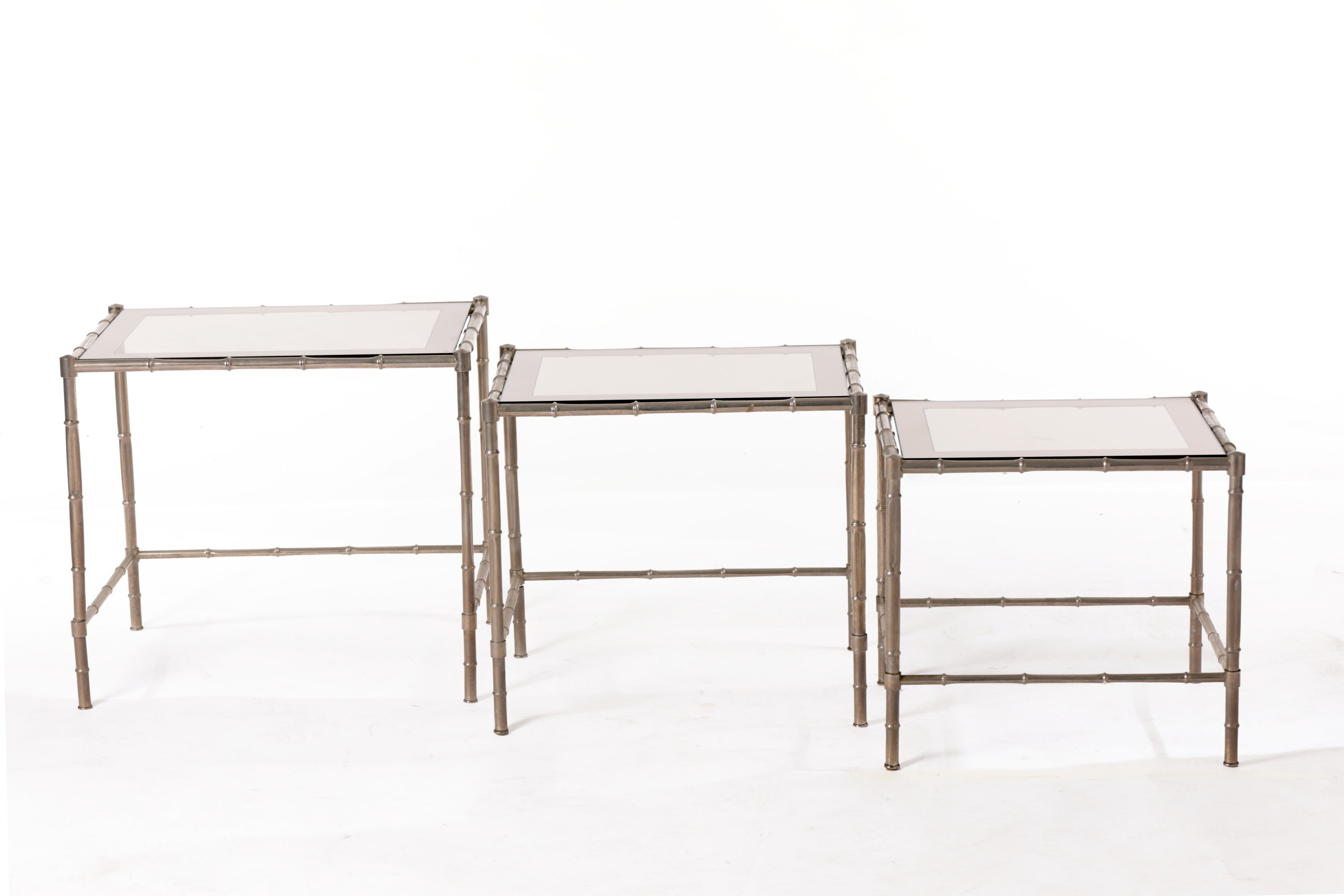 Triptych of silver bamboo tables from the 70s
