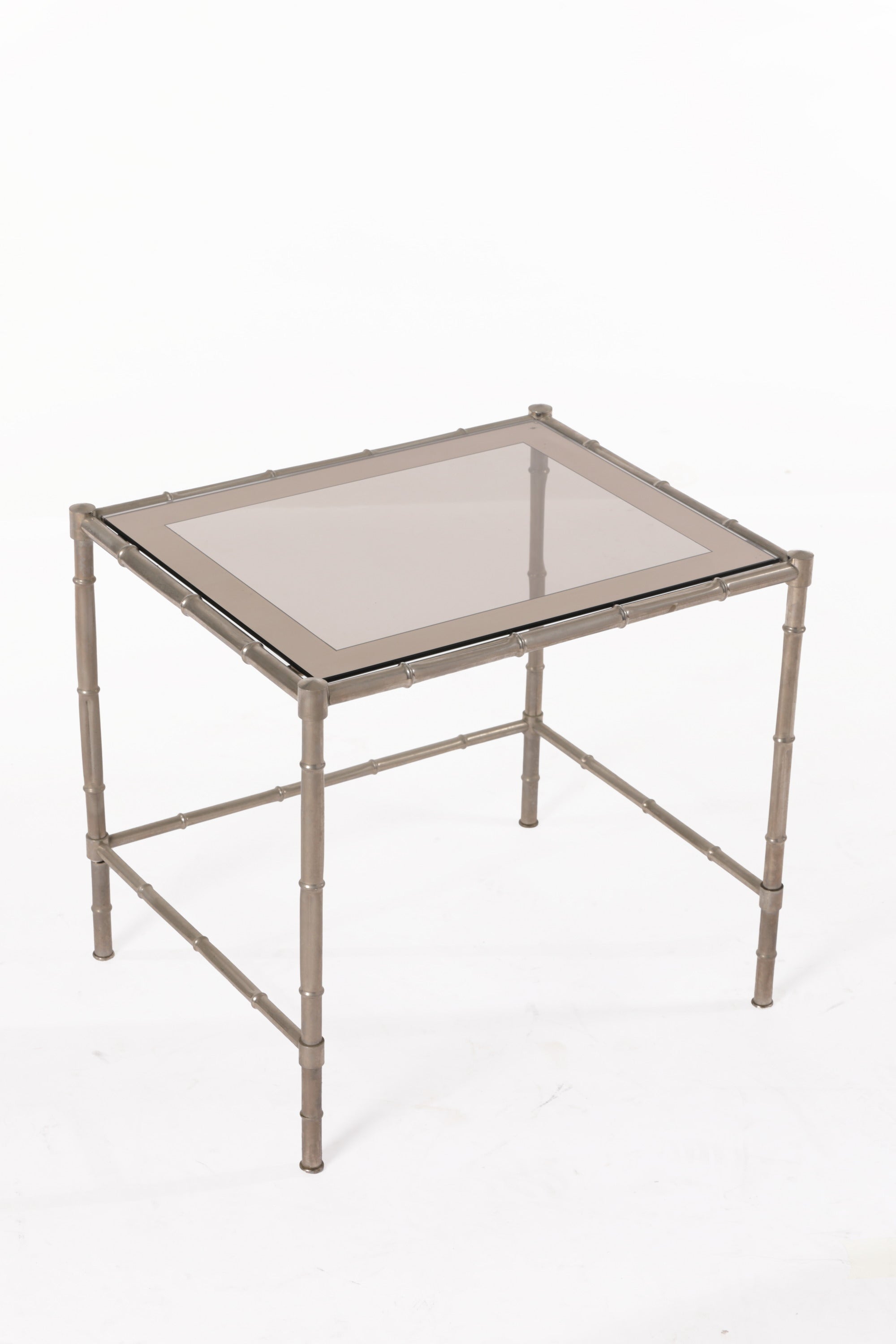 Triptych of silver bamboo tables from the 70s
