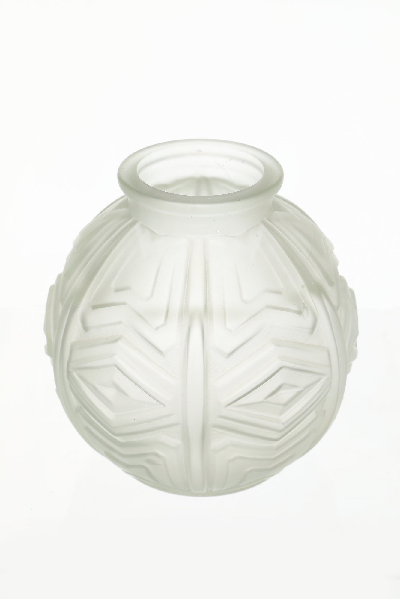 Spherical sandblasted vase with geometric decoration