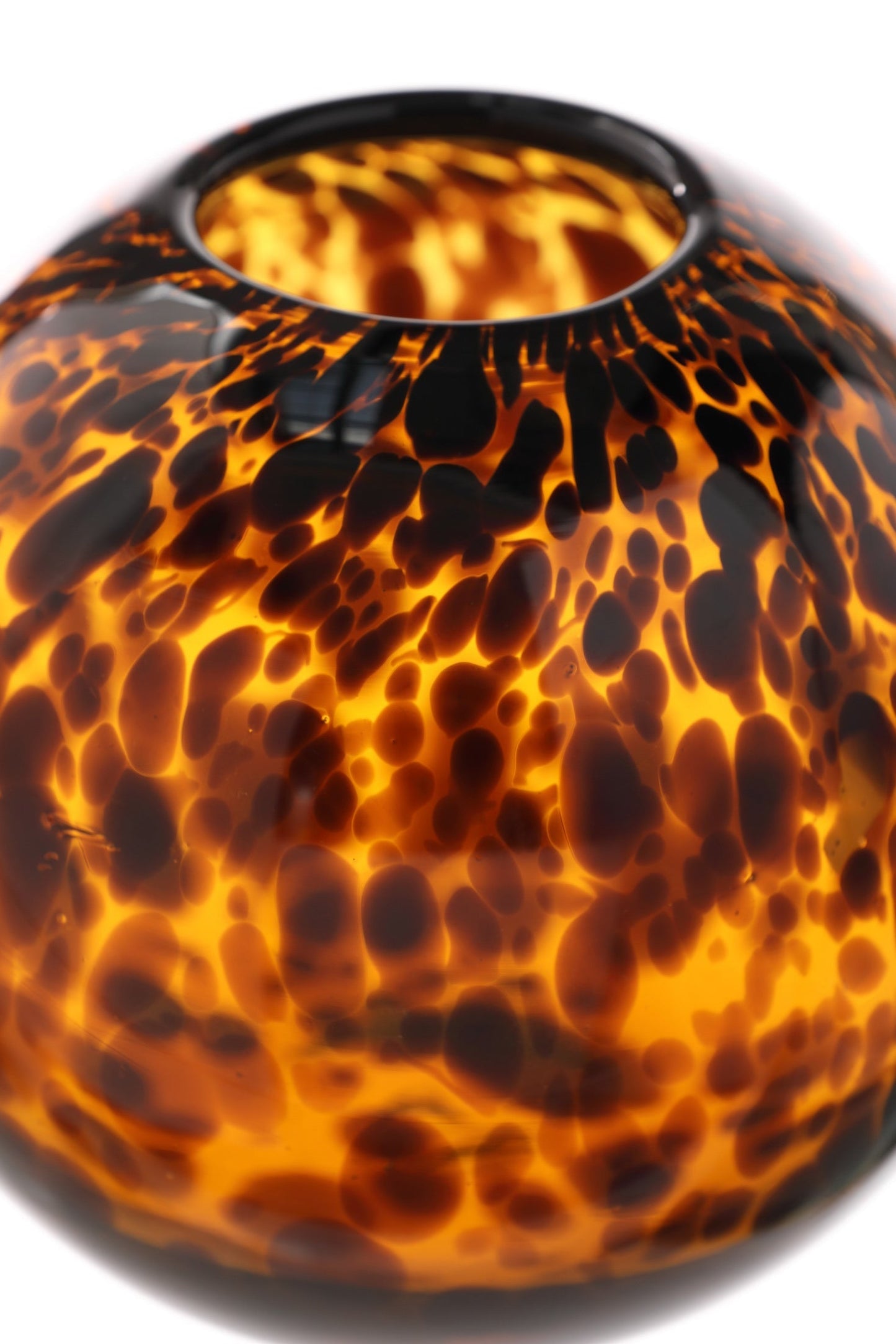 Spherical vase from the 70s in spotted glass