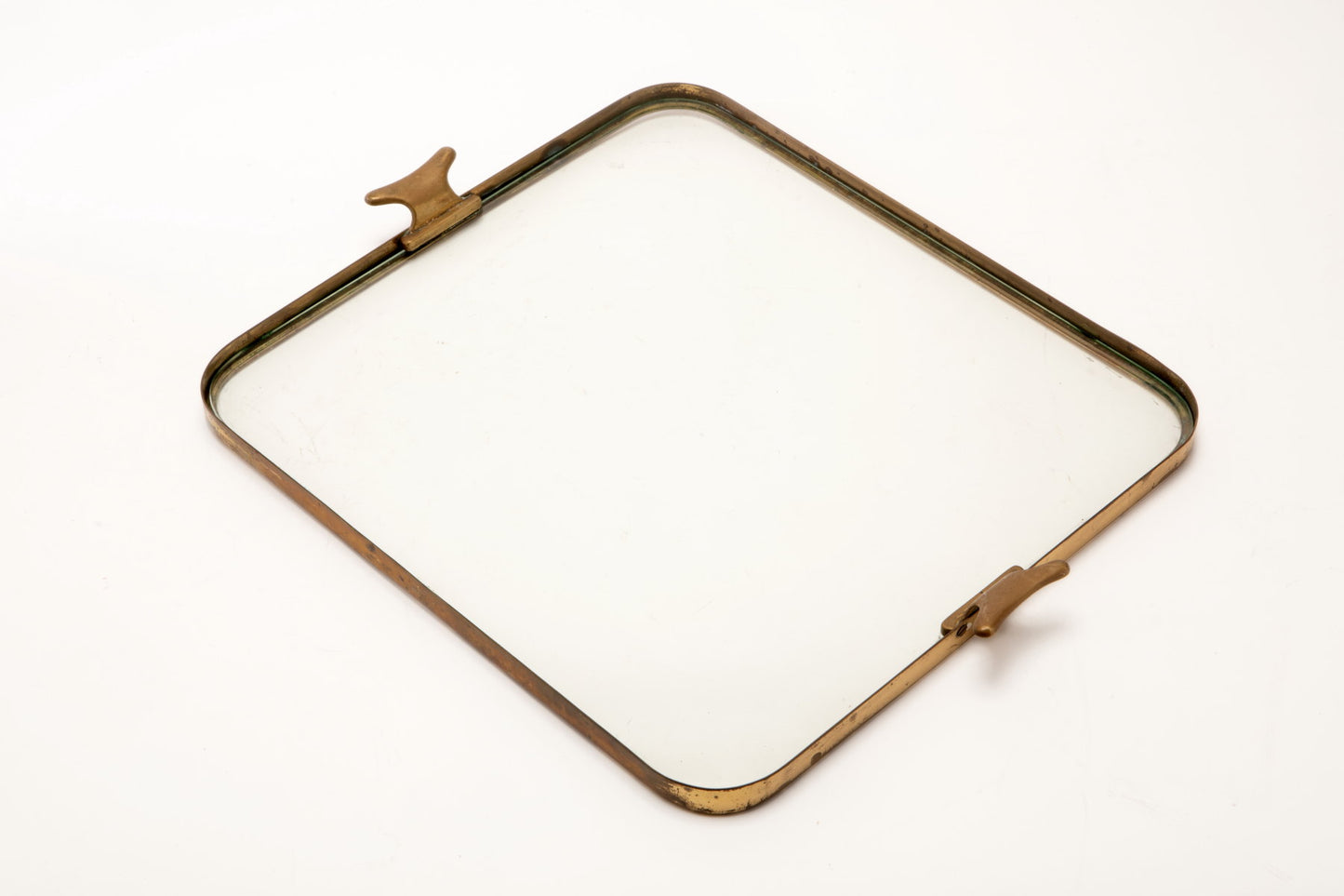 Rounded brass tray from the 50s