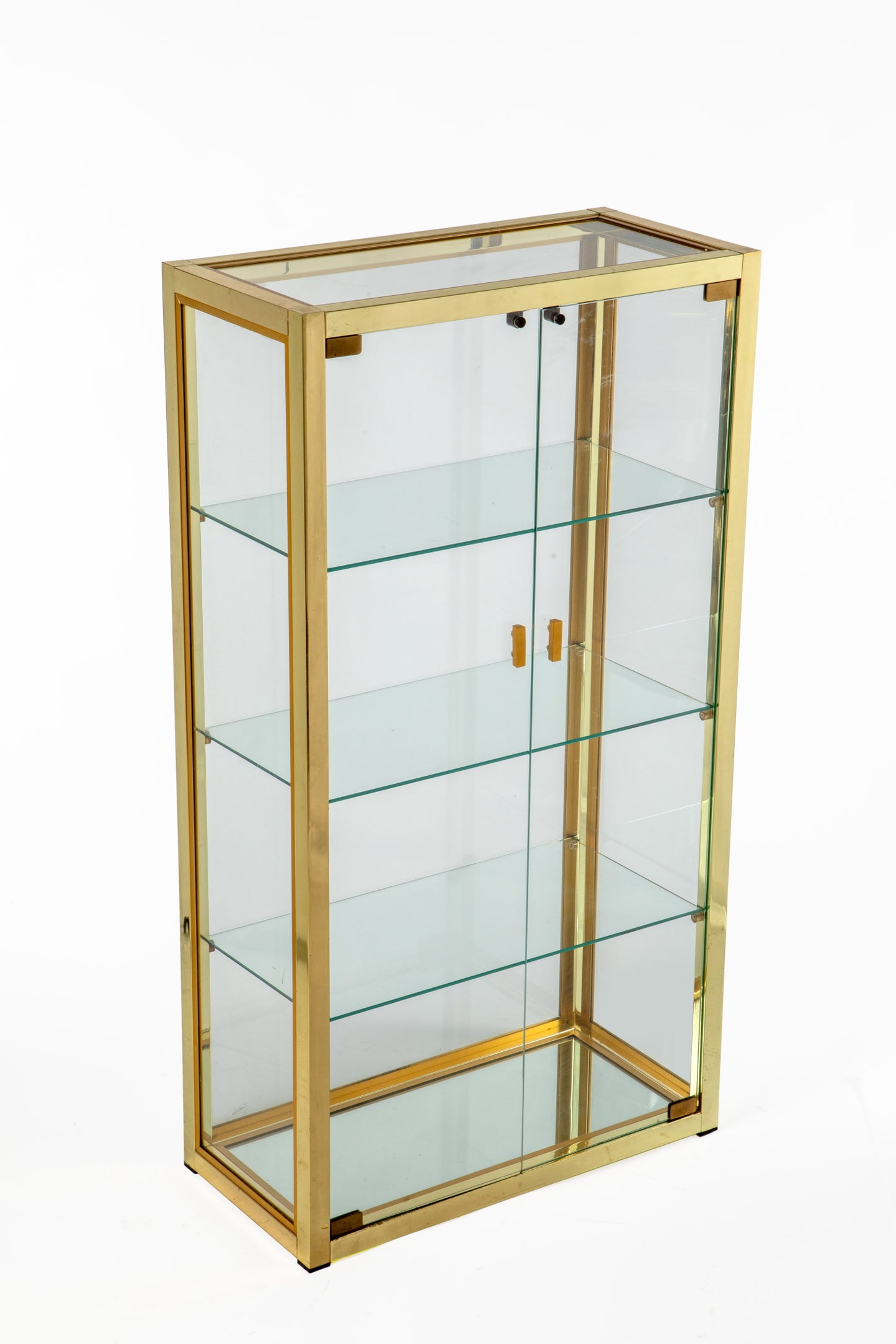 Showcase from the 70s in brass and glass